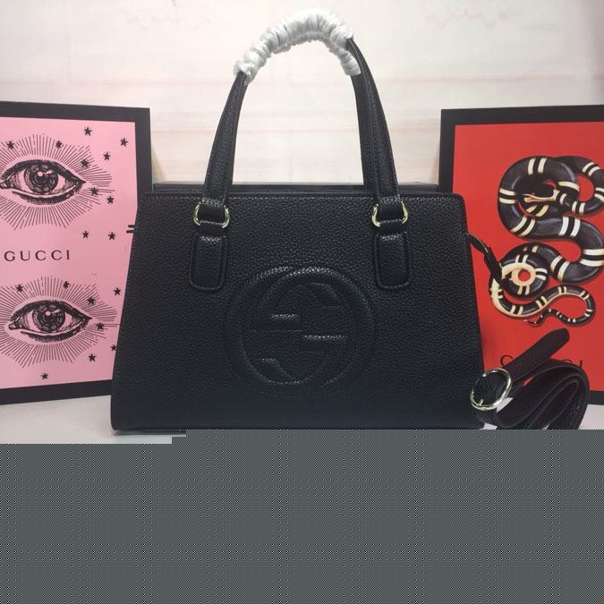 G*u*i top handle bags